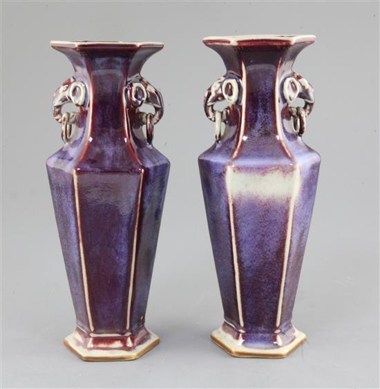 A pair of Chinese flambe glazed hexagonal baluster vases,